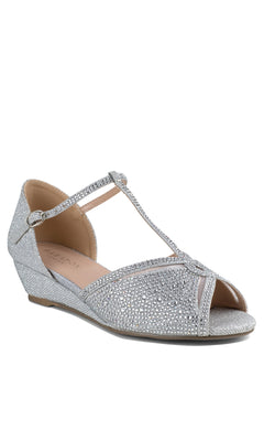 The Janelle Silver Prom Shoes by Paradox London (P2210) feature a low wedge, rhinestone-embellished T-strap, open toe, and ankle buckle—perfect silver shimmer sandals for prom.