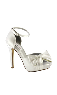 The Jay White Satin Prom Shoes by Dyeables (24812) feature stiletto heels, an ankle strap, and a large bow on the toe for a sophisticated, elegant look.