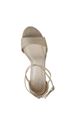 The Jordy Champagne Glitter Prom Shoe by Touch Ups 4630 features an open toe, ankle strap, and low block heel—ideal as block heel prom shoes—shown solo from above on a white background.
