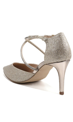 The Kennedy Champagne Prom Shoes by Paradox London (P2238) are women's glittery gold stilettos with pointed toes and crisscross ankle straps, shown from a rear side angle on a white background.