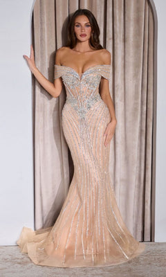 A woman stands before beige curtains wearing the Ladivine KV1130 Off-Shoulder Mermaid Prom Gown, featuring silver embellishments and a chic mermaid silhouette.