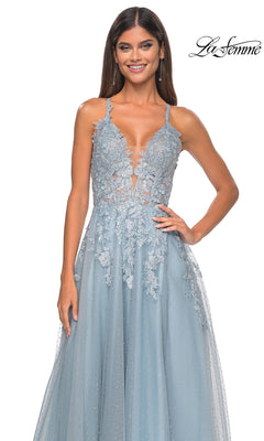 The La Femme Lace-Embroidered Long Prom Dress 32147 features floral lace appliqué on a sheer bodice, thin straps, and a flowing dotted light blue skirt for an elegant look.