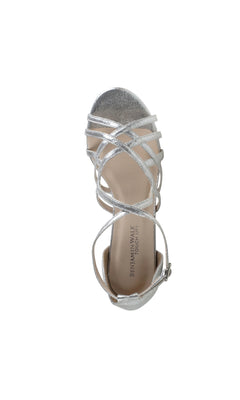 The Lupe Silver Shimmer Prom Dress Shoes (Touch Ups 4621) are strappy, open-toe sandals with a low heel and silver shimmer finish, viewed from above. Perfect as prom shoes, the insole is labeled "Benjamin Walk by Touch Ups.