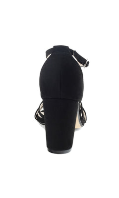 The Lupe Black Prom Dress Shoes: Touch Ups 4623 feature a rear view of black strappy heels with an ankle strap and closed heel counter, making them chic black prom shoes set against a white background.