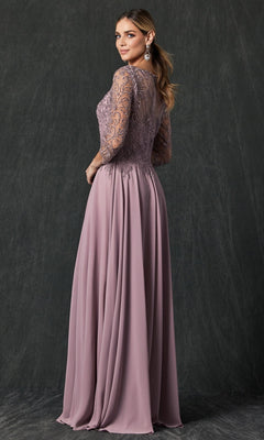 A woman poses against a dark textured background, looking over her shoulder, wearing the Long Formal Dress: Juliet M11—a mauve gown featuring lace sleeves, an embroidered bodice, and a flowing chiffon skirt.