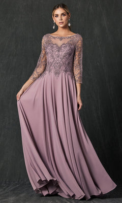 A woman poses against a dark background wearing the Juliet M11 long formal dress in mauve, featuring lace sleeves and an intricately embroidered bodice, as she holds out one side of the flowing chiffon skirt.