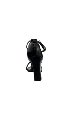 The Maddox Block-Heel Black Prom Shoes (Dyeables 58317) are shown from the back, featuring a closed heel counter, ankle strap, and fashionable block heels for extra comfort.