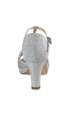 Rear view of the Nora Silver Shimmer Prom Shoes (Paradox London P2226), featuring stiletto heels, an ankle strap with buckle, and a shimmering silver finish, shown against a white background.