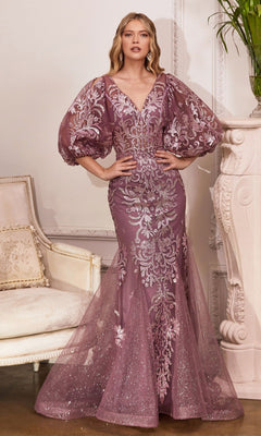 A woman stands indoors wearing the Puff-Sleeve Long Glitter Formal Dress OC009, featuring a floor-length mauve design with silver embroidery, puffed sheer sleeves, and a fitted flared skirt.