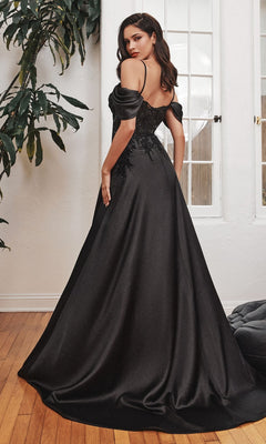 A woman stands on a wooden floor, facing away, wearing the Cold-Shoulder Long Satin A-Line Prom Dress OC012, with large windows and a leafy plant in the background.