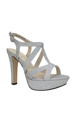 The Queenie Silver Glitter Prom Shoes by Touch Ups 4222 feature a dazzling T-strap design, open-toe platform sole, and adjustable ankle strap—perfect for making a sparkling entrance at any formal event.