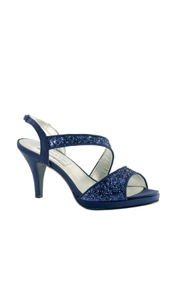 The Reagan Navy Prom Shoes (Touch Ups 4125) feature glittery straps, an open toe, and a mid-height heel—ideal as navy blue formal shoes for special occasions. Shown on a white background.