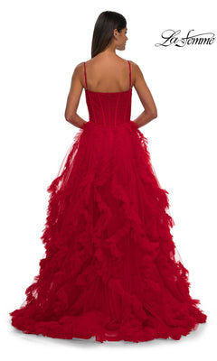 A woman with long dark hair is shown from the back wearing the La Femme 32719 Ruffled-Tulle Long Prom Ball Gown, featuring thin straps and a lace corset bodice. The La Femme logo appears in the top right corner.