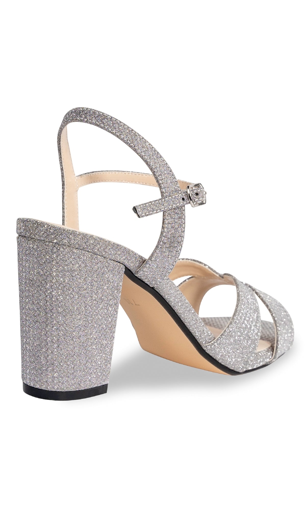 The Riley High-Heel Silver Prom Shoes (Touch Ups 4656) feature a silver glitter finish, ankle strap, and block heel—seen from a back side angle—perfect for your next special event.