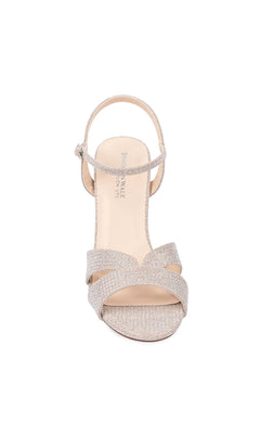 Front view of Riley 2.5" Champagne Prom Shoes by Touch Ups 4657, featuring a glittery finish, open toe, ankle strap, high heel, and crisscross toe design.