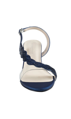 The Ruby Navy Blue Metallic Prom Shoes (Touch Ups 4592) are open-toe sandals with beaded straps, low block heels, and an ankle buckle, shown from the front against a white background.