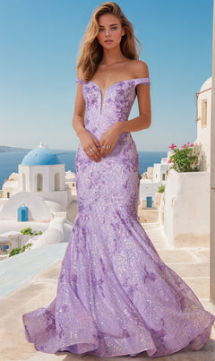A woman in the Off-the-Shoulder Sequin Mermaid Prom Dress 2412 stands on a sunlit terrace, gazing over white buildings and blue domes by the sea.