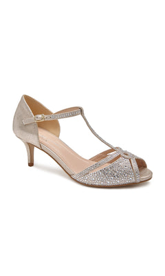 The Seva Champagne Prom Shoes by Paradox London (P1838) feature a low heel, T-strap, open toe, ankle buckle, and rhinestone details—ideal for pairing with gold or beaded prom shoes for a sparkling look.