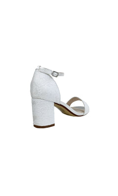 The Summer White Lace and Satin Prom Shoes: Dyeables 4258 are white block-heeled sandals with an ankle strap, open toe, lace texture, and side buckle—perfect as white prom shoes. Shown on a plain white background.