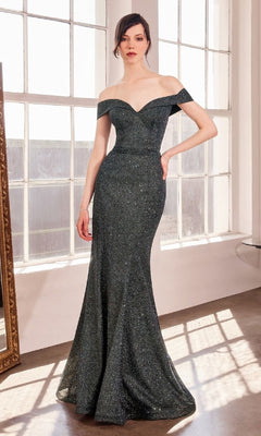 A woman wearing the Off-Shoulder Sweetheart Prom Gown: Amoris T602 stands in a sunlit room with large windows.