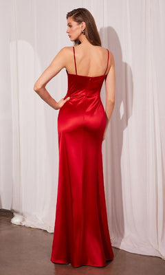 A woman stands with her back to the camera in front of white curtains, wearing the Amoris T608 Long Sweetheart Prom Dress—a sleeveless red satin gown featuring thin straps and a corset-style bodice.
