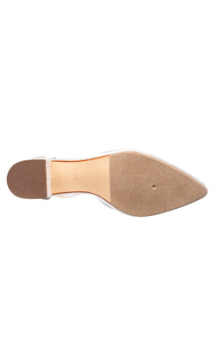 The image shows the sole of the Tegan White Shimmer Prom Shoes (Touch Ups 4663), a pointed-toe women's low-heel shoe with a flat brown heel and a beige suede-like bottom.