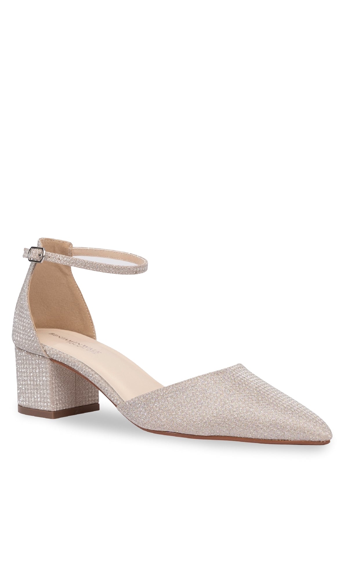 The Tegan Champagne Shimmer Prom Shoe (Touch Ups 4664) is a women’s low-heel, closed-toe style with a pointed toe, glittery fabric, low block heel, and ankle strap—ideal for a stylish prom look.