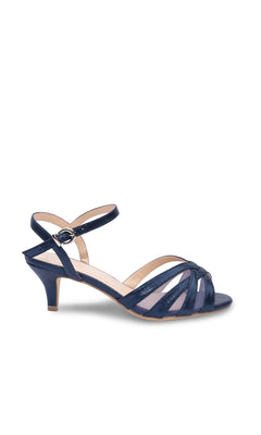 The Theresa Navy Blue Prom Shoes (Paradox London P2307) feature a heeled sandal design with ankle strap, open toe, and crisscross straps—perfect for a chic navy blue prom look.