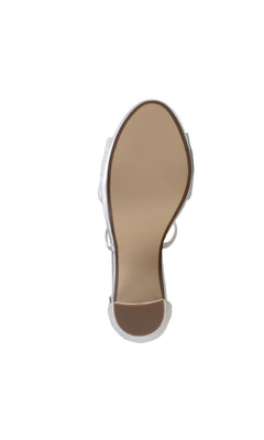 The image displays the bottom view of the Violet White Lace Prom Shoe (Dyeables 4611), featuring a single white lace design, tan-colored sole, and textured heel tip.