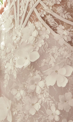 Close-up of the Short White Dress: Andrea and Leo WL083, a strapless design with delicate white lace, 3D floral appliqués, and bead accents—ideal for weddings or formal occasions.