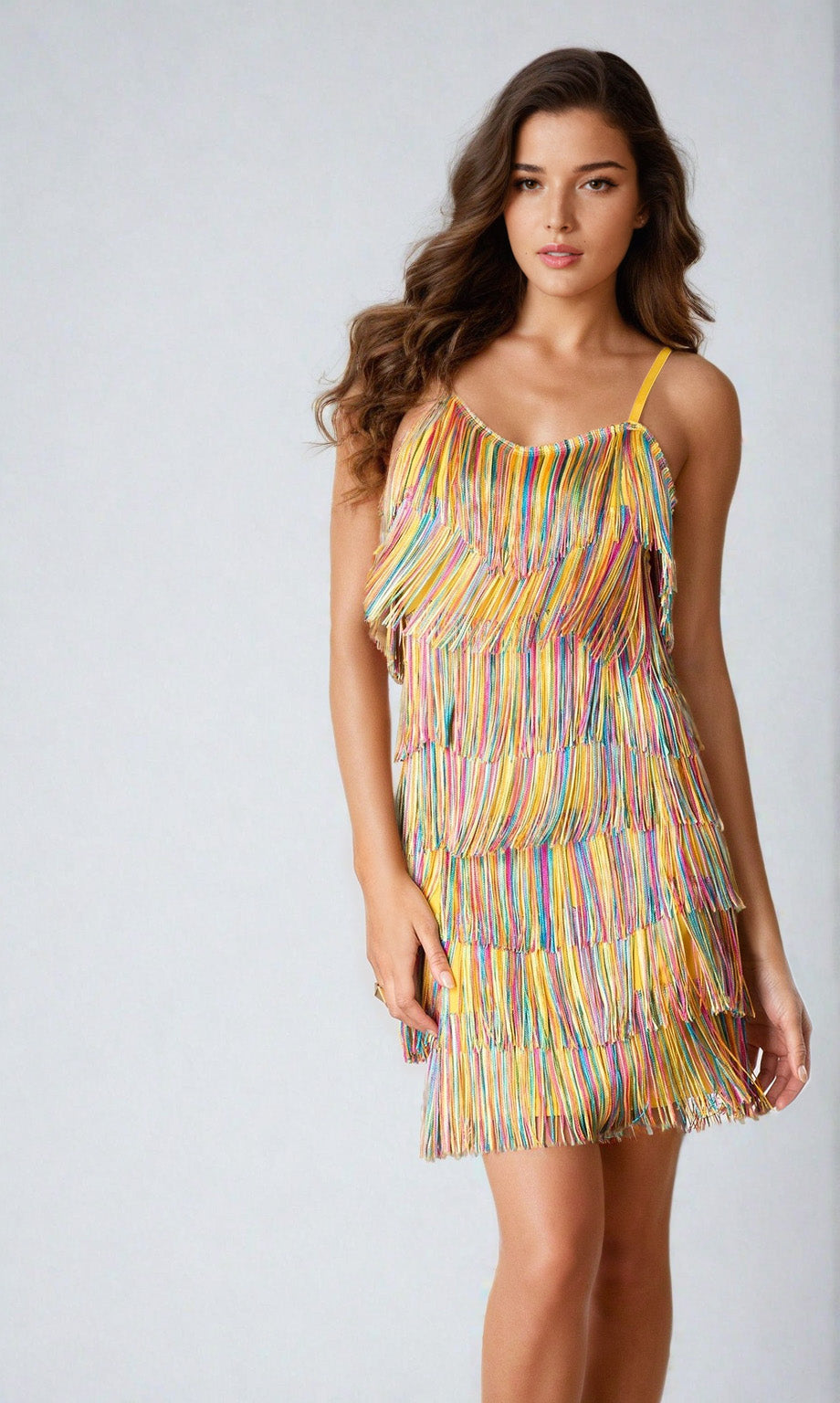 A woman models the Cheryl Creations 1415 Short Fringe Party Dress—a sleeveless, v-neck party dress with colorful, layered fringe—against a plain light background.