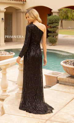 A woman in a Long Sequin Prom Dress with one long sleeve stands by a pool in an outdoor courtyard, facing away from the camera.