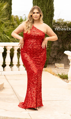 A woman stands outdoors in a One-Shoulder Long Sequin Plus-Size Prom Dress in floor-length red, surrounded by greenery and white columns that highlight the elegance of her evening look.