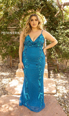 A woman poses outdoors before a stone arch and greenery in the Plus-Size Long Sequin Prom Dress 14005, featuring floral details. The word "PRIMAVERA" is displayed on the left.