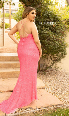 A woman wearing a Plus-Size Long Sequin Prom Dress with a wrap skirt stands on a stone path near steps and greenery, facing away from the camera.