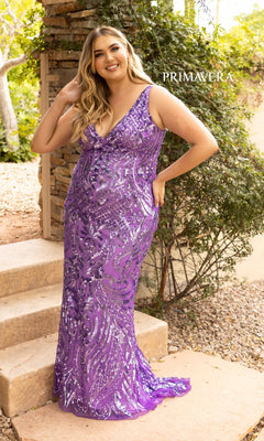A woman stands outdoors on stone steps, smiling with one hand in her hair, wearing the Sleek Plus-Size Sequin-Print Long Prom Dress 14008. The word "PRIMAVERA" appears in the background.