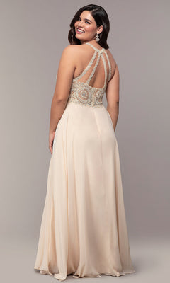 A woman stands smiling over her shoulder in a Long Chiffon Embroidered-Bodice Prom Dress, featuring a sleeveless design, embellished open back, and flowing floor-length skirt.