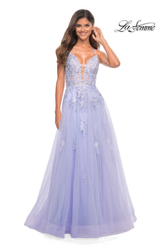A woman wearing a lavender La Femme Open-Back Long Ball Gown with lace stands against a white background.