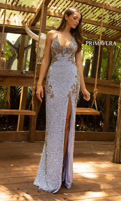 A woman stands on a wooden deck by a swing wearing a fitted lavender V-Neck Sequin Long Prom Gown with lace-up back, featuring floral embellishments and a thigh-high slit.