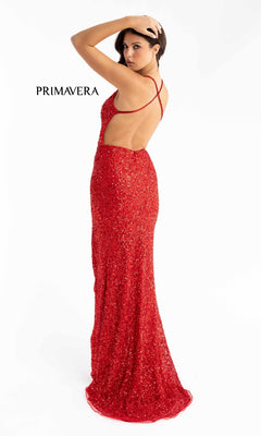 A woman poses with one arm raised, facing away in a red Backless Tight Long Sequin Prom Dress 3291D, detailed with sparkling sequins. "PRIMAVERA" is displayed on the left.
