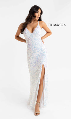 A woman models the Pastel Sequin-Pattern Long Prom Dress 3295, featuring a sleeveless design and thigh-high slit, against a plain background. The word "PRIMAVERA" appears beside her.