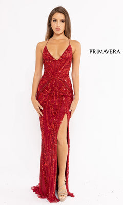 A woman faces forward wearing the Strappy-Back Long Sequin Prom Dress 3958—red, beaded, floor-length with a thigh-high slit and strappy heels. "PRIMAVERA" appears on the right.