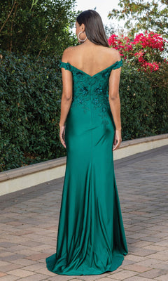 A woman stands on a paved path in an outdoor garden, facing away from the camera, wearing the Off-the-Shoulder Long Prom Dress with Floral Details.