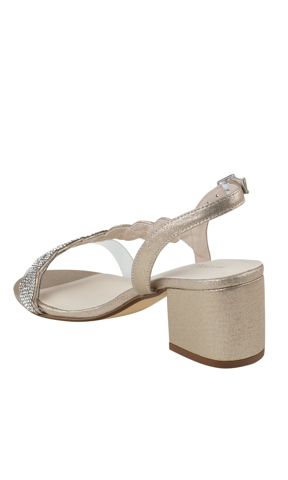The Champagne Twisted Low Heel Prom Shoes Ruby 4591 feature a beige hue, slingback strap, open toe, and rhinestone front embellishments—ideal for prom or any special occasion.