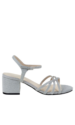 The Delilah Silver Low Heel Strappy Prom Shoes 4593 feature multiple thin straps and an ankle buckle, elegantly displayed in side profile against a white background.