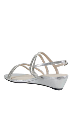 The Jodi Rhinestone Silver Prom Sandals by Touch Ups (style 4595) feature a strappy design, low wedge heel, jeweled open toe, and slingback strap—ideal for adding sparkle to your special night.