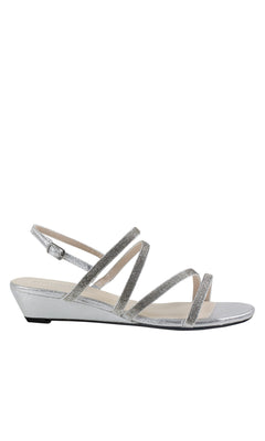 The Jodi Rhinestone Silver Prom Sandals by Touch Ups 4595 feature a sleek, silver strappy design with a low wedge heel and adjustable ankle strap, perfect for adding elegance to any special occasion. Displayed on a white background.