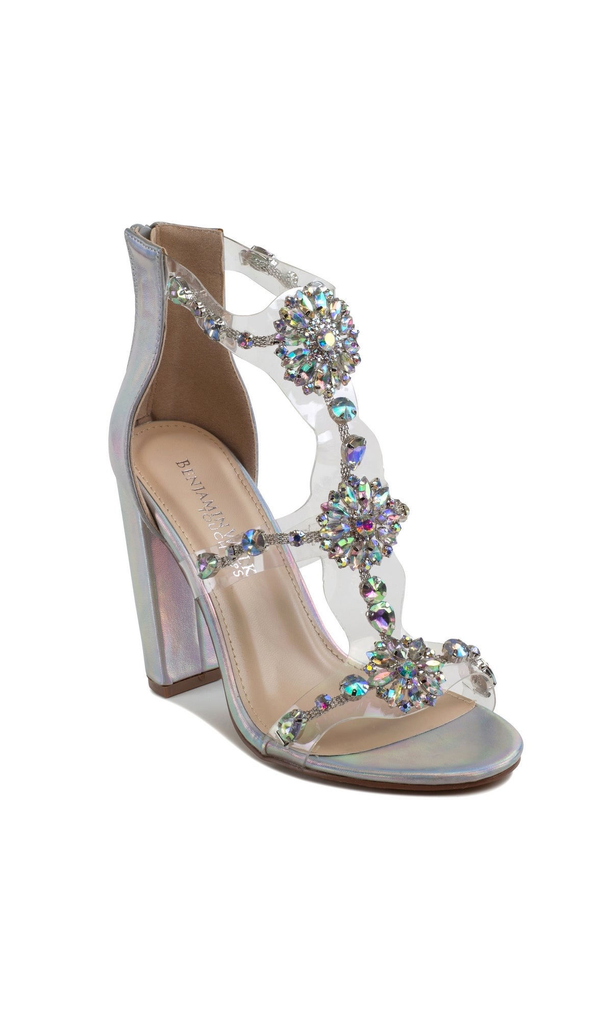 The Ara High Heel Silver Prom Shoes 4603 feature iridescent straps and bold rhinestone accents, making them the perfect dazzling choice for a glamorous prom look.