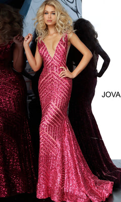A woman stands in front of a mirror wearing the Jovani Prom Dress with Striped Sequin Pattern, a sleeveless, floor-length pink v-neck gown.