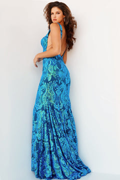 Woman posing against a plain light background in a Backless Jovani Prom Dress with Sequin Pattern, featuring vibrant blue and green hues.